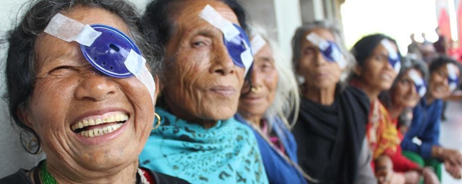 Eye-care team supporting patients