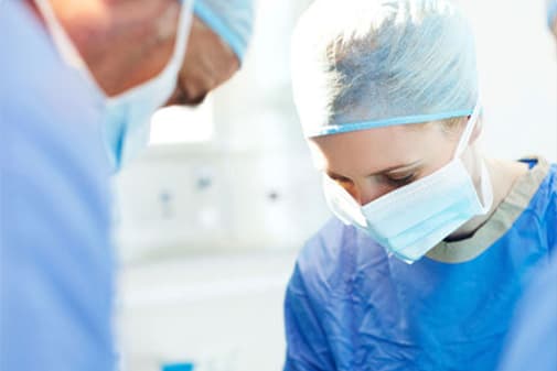 Surgeon working in an operating theatre